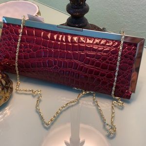 New clutch In Burgundy- mint condition